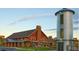 Community clubhouse features a silo-inspired tower and red barn-style architecture at 3111 Youngheart Way, Castle Rock, CO 80109