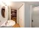 Functional bathroom with vanity and shower, and easy access to other rooms at 19706 E Bellewood Dr, Centennial, CO 80015