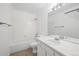 Clean bathroom with a shower-tub combo and a white vanity at 2575 S Syracuse Way # H206, Denver, CO 80231