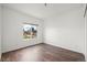 Bright bedroom with wood floors and window at 2575 S Syracuse Way # H206, Denver, CO 80231