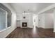 Bright living room with sleek floors, fireplace, and ample natural light at 2575 S Syracuse Way # H206, Denver, CO 80231