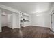 Bright living room features sleek floors and an open layout to the kitchen at 2575 S Syracuse Way # H206, Denver, CO 80231