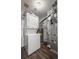 Utility room with stacked washer and dryer, and a utility sink at 2575 S Syracuse Way # H206, Denver, CO 80231