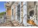 Balcony with white railings with an entrance to the living room at 1284 N Corona St # B6, Denver, CO 80218