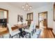 Elegant dining room featuring a wooden table, upholstered chairs, and classic details, perfect for gatherings at 1284 N Corona St # B6, Denver, CO 80218