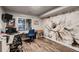 Office featuring a large flower mural and a walk-out to a patio with stunning views at 25779 E Jamison Cir, Aurora, CO 80016