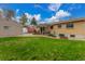 Beautiful backyard featuring a well-maintained lawn, and patio at 6905 Nelson St, Arvada, CO 80004