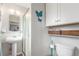 Bright bathroom featuring a pedestal sink, toilet, and glass door shower at 6905 Nelson St, Arvada, CO 80004
