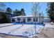 House exterior showcasing front yard and driveway at 625 S Monroe Way, Denver, CO 80209