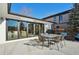 View of the backyard patio with seating at 625 S Monroe Way, Denver, CO 80209