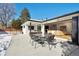 Backyard patio with hot tub and seating area at 625 S Monroe Way, Denver, CO 80209