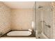 Modern bathroom features a soaking tub and a glass-enclosed shower at 1133 14Th St # 3420, Denver, CO 80202