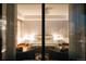 Serene bedroom with elegant decor, a comfortable bench, and floor-to-ceiling windows at 1133 14Th St # 3420, Denver, CO 80202