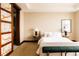 Stylish bedroom with marble sliding doors, and carpet at 1133 14Th St # 3420, Denver, CO 80202