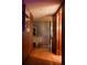 Elegant hallway with hardwood floors, custom shelving, and recessed lighting, creating a welcoming entrance at 1133 14Th St # 3420, Denver, CO 80202