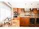 Spacious kitchen with stainless steel appliances, granite countertops, and wine cooler at 1133 14Th St # 3420, Denver, CO 80202