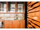Gourmet kitchen with custom cabinets, granite countertops, modern appliances, and a built-in wine fridge at 1133 14Th St # 3420, Denver, CO 80202