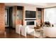 Inviting living room featuring a fireplace, media center, and stylish decor elements at 1133 14Th St # 3420, Denver, CO 80202