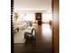 Open-concept living room with ample natural light, elegant furniture, and hardwood flooring at 1133 14Th St # 3420, Denver, CO 80202