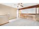 Bonus room features neutral carpeting and wood trim at 2141 S Victor St # B, Aurora, CO 80014
