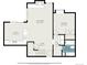 Detailed floor plan of the lower level, featuring a kitchen, living room, foyer, bedroom, hall and bathroom at 2141 S Victor St # B, Aurora, CO 80014