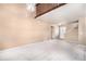 Bright living room with high ceilings, a staircase, and lots of natural light at 2141 S Victor St # B, Aurora, CO 80014
