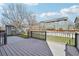Spacious backyard with a large deck, shed, and lawn area perfect for outdoor living at 12248 Kittredge St, Commerce City, CO 80603