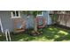 Backyard shed surrounded by lush greenery and flowers at 12248 Kittredge St, Commerce City, CO 80603