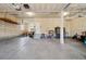 Spacious garage with overhead storage and ample room for vehicles and tools at 12248 Kittredge St, Commerce City, CO 80603