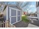 Backyard shed featuring white trim and gray paint at 12248 Kittredge St, Commerce City, CO 80603