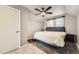 Comfortable bedroom features a ceiling fan and a plush rug for a relaxing retreat at 14742 E Radcliff Pl, Aurora, CO 80015