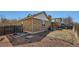 Backyard with a patio and a view of the home's brick exterior at 1467 S Kenton St, Aurora, CO 80012