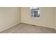 Bright bedroom with neutral walls, carpet flooring, and a large closet at 1267 Bluejay Ave, Brighton, CO 80601