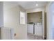 Convenient laundry room with washer and dryer hookups at 1267 Bluejay Ave, Brighton, CO 80601