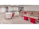 Spacious basement living area features a comfortable seating arrangement, perfect for Gathering gatherings at 15647 Weaver Gulch Dr, Morrison, CO 80465