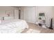 Charming bedroom features a bed, closet, and decorative furniture, creating a cozy and inviting space at 15647 Weaver Gulch Dr, Morrison, CO 80465