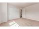 Neutral bedroom features a closet and a doorway, providing ample storage and easy access at 15647 Weaver Gulch Dr, Morrison, CO 80465