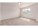 Bright bedroom with large window and mountain views, perfect for relaxation and enjoying the scenery at 15647 Weaver Gulch Dr, Morrison, CO 80465