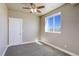 Simple bedroom with neutral walls and carpeting at 45425 Wolf Creek Dr, Bennett, CO 80102