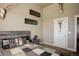 Bedroom with gray bed frame, wall decor, and a closet at 45425 Wolf Creek Dr, Bennett, CO 80102