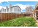 Large backyard with wooden fence and patio at 6119 Zenobia Ct, Arvada, CO 80003