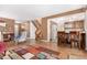 Kitchen with wooden cabinets and breakfast bar at 6119 Zenobia Ct, Arvada, CO 80003