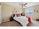 Bedroom with neutral paint, ceiling fan and carpeted floors at 9158 Forest St, Firestone, CO 80504