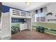 Fun bedroom featuring a loft bed, blue and green color scheme, and a playful atmosphere at 3008 Echo Park Dr, Castle Rock, CO 80104