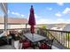 Spacious wooden deck with outdoor furniture, perfect for dining and relaxation with neighborhood views at 3008 Echo Park Dr, Castle Rock, CO 80104