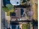 An overhead shot displaying the backyard, with solar panels and a well-kept lawn at 5370 W 74Th Ave, Arvada, CO 80003