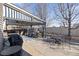Backyard covered patio area with furniture, lighting, and grill at 5370 W 74Th Ave, Arvada, CO 80003