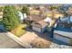 Charming ranch-style home featuring an attached garage and a well-manicured lawn at 5370 W 74Th Ave, Arvada, CO 80003
