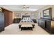 Serene bedroom featuring neutral tones, a comfortable bed, ample closet space, and soft natural light at 5370 W 74Th Ave, Arvada, CO 80003