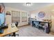 Functional office space with desk, storage, and natural light at 5370 W 74Th Ave, Arvada, CO 80003